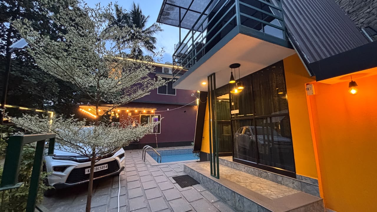 Courtyard at Swarg Residency with pool and warm lights